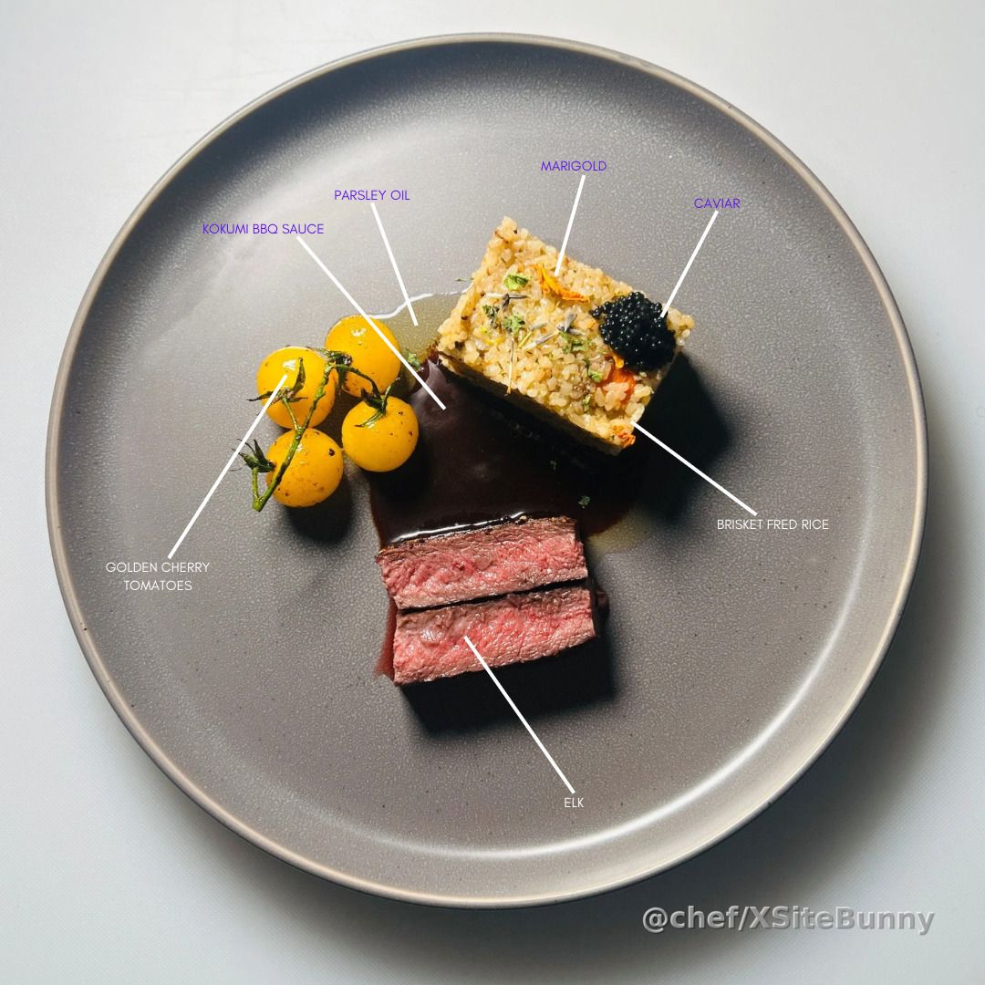 Elevated BBQ with global soul—this dish was created to honor flavor, balance, and the people I cook for.

Perfectly cooked elk served with golden cherry tomatoes, a rich kokumi BBQ sauce, and a layered block of brisket fried rice topped with marigold, parsley oil, and caviar.

Every bite is a meeting of smoke, elegance, and technique—because fine dining can still bring the fire.

