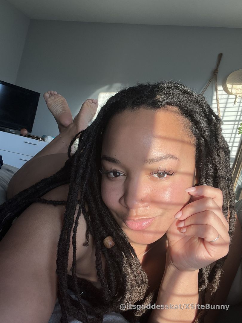 Sun kissed laying in the pose 