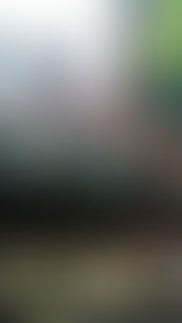 Chilling out showing off outside a cafe in Brooklyn across from some delivery bike guys. 