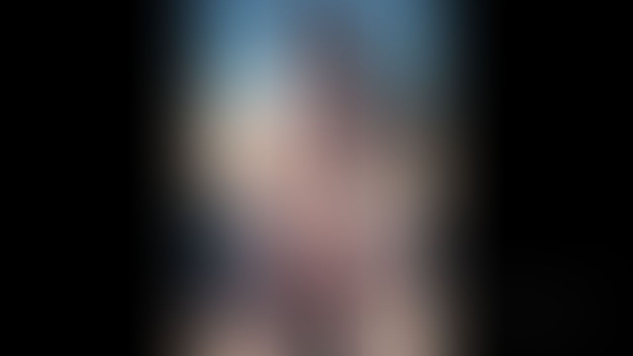 video - posing on the beach in a black bikini... teasing you